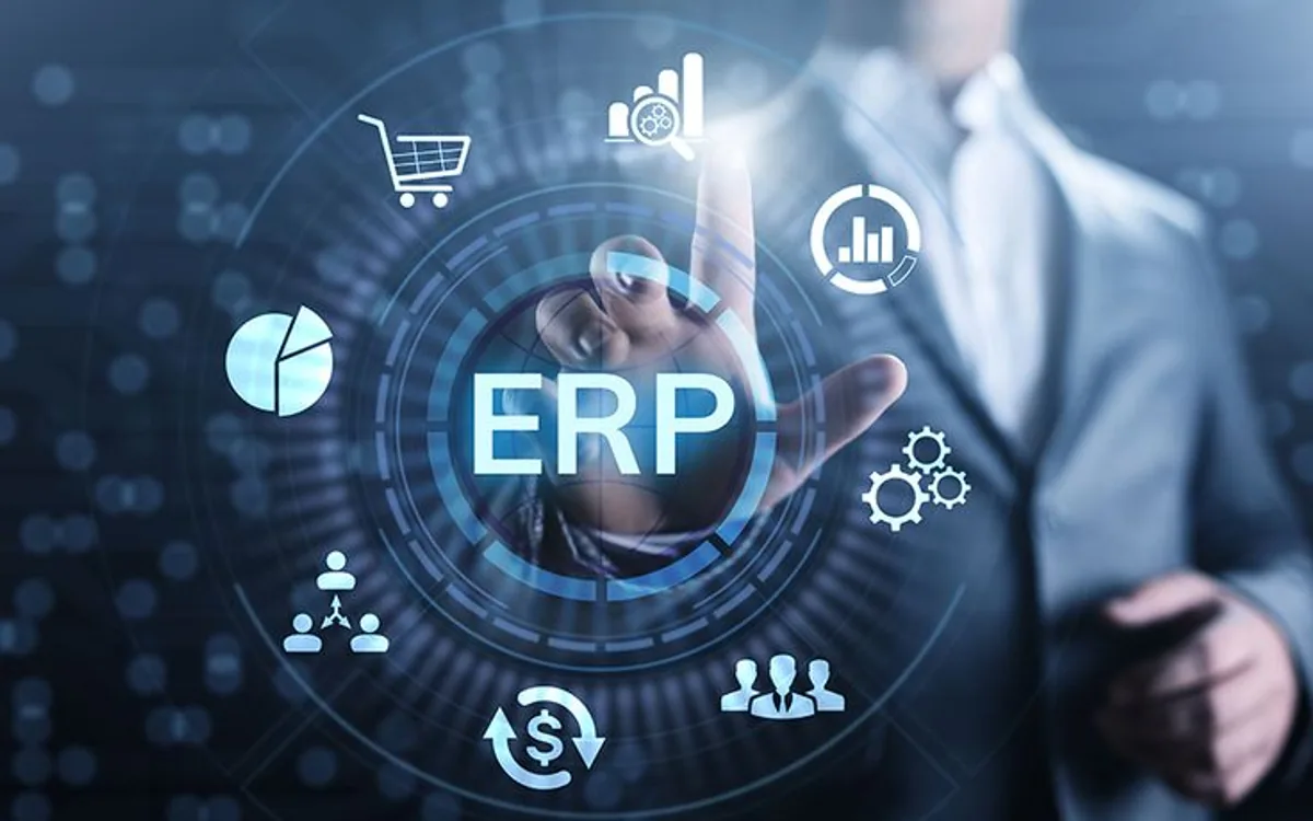 Icono conceptual de ERP rodeado de símbolos de compras, reportes, nómina y finanzas